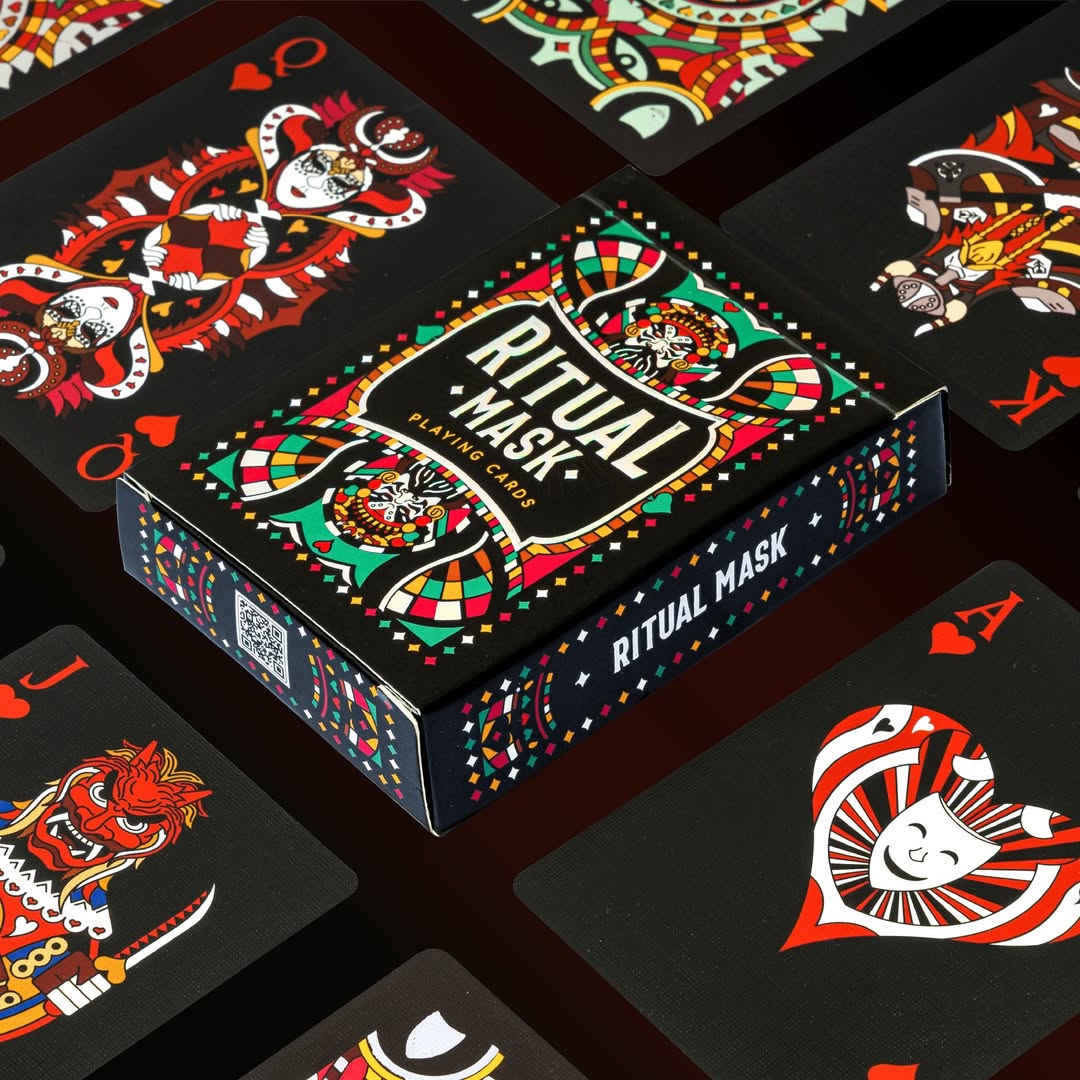 Ritual Mask playing cards packaging with card designs on a dark background